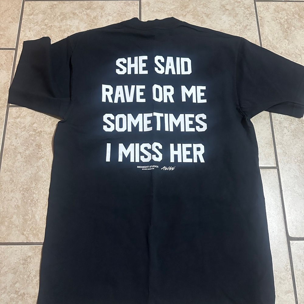 Black Tee with Bold White Text